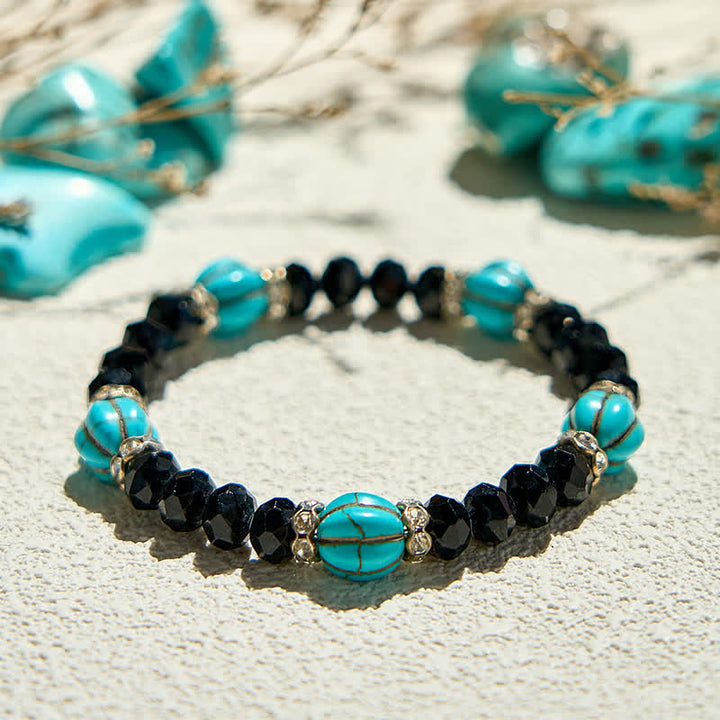 Pulsera de cuentas de obsidiana turquesa con forma de calabaza de Olivenorma