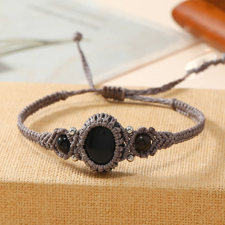 Pulsera trenzada con cristales de talla ovalada y tejido envolvente de Olivenorma