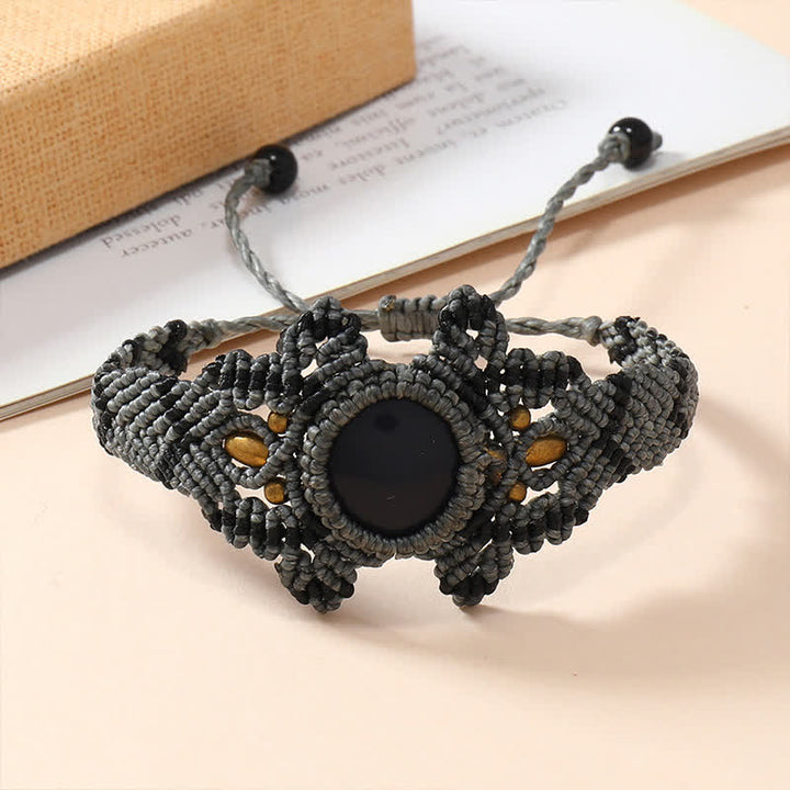 Pulsera trenzada con cristales envueltos y tejida a mano de Olivenorma