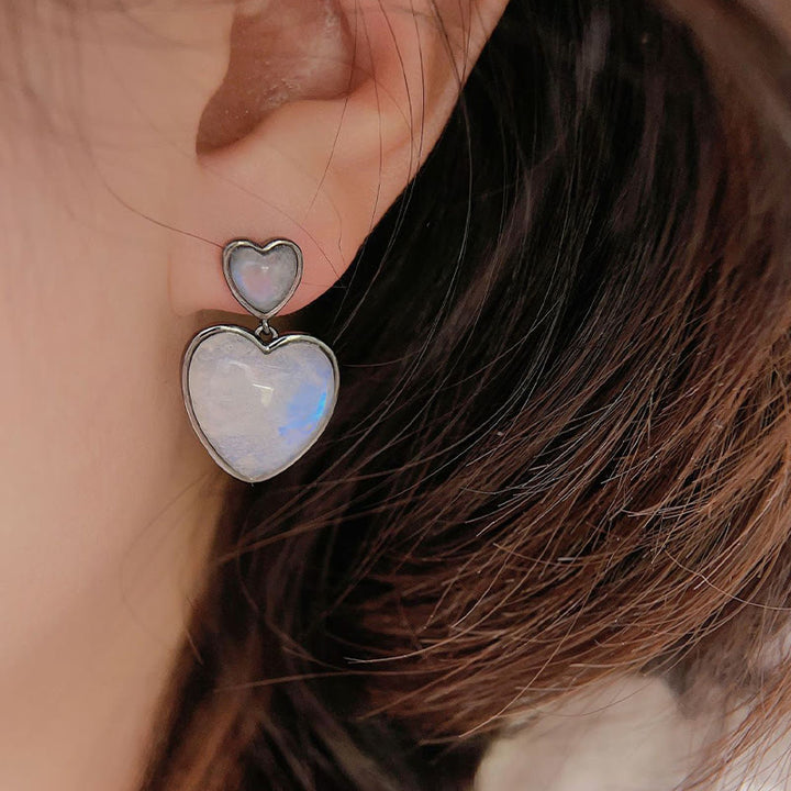Pendientes colgantes con forma de corazón de piedra lunar de Olivenorma