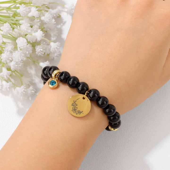 Pulsera de cuentas con dije de flor de nacimiento con piedra natal de 8 mm de Olivenorma