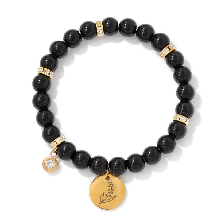 Pulsera de cuentas con dije de flor de nacimiento con piedra natal de 8 mm de Olivenorma