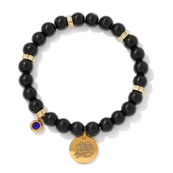 Pulsera de cuentas con dije de flor de nacimiento con piedra natal de 8 mm de Olivenorma