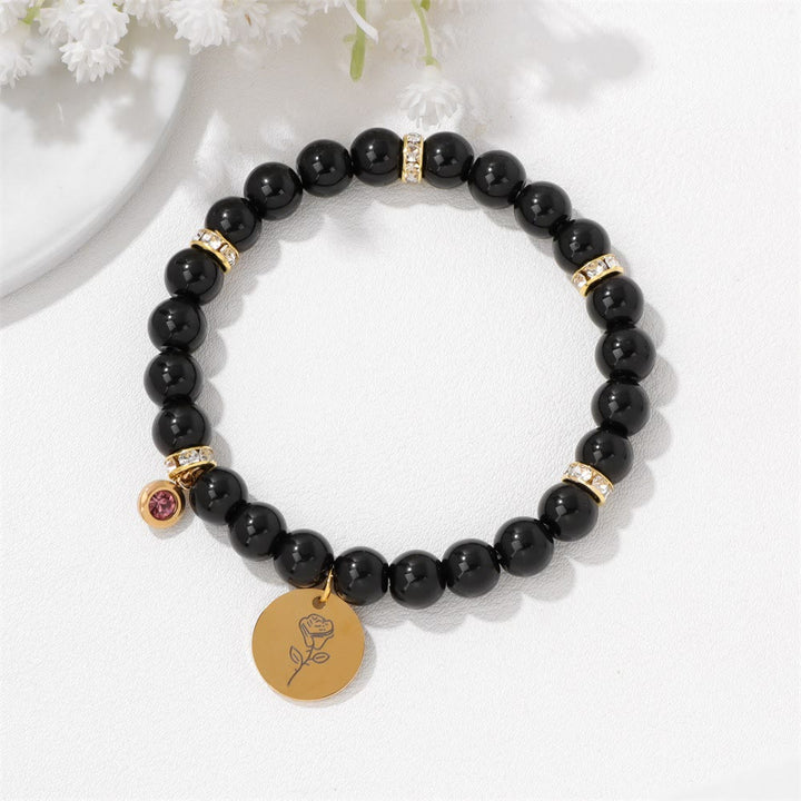 Pulsera de cuentas con dije de flor de nacimiento con piedra natal de 8 mm de Olivenorma