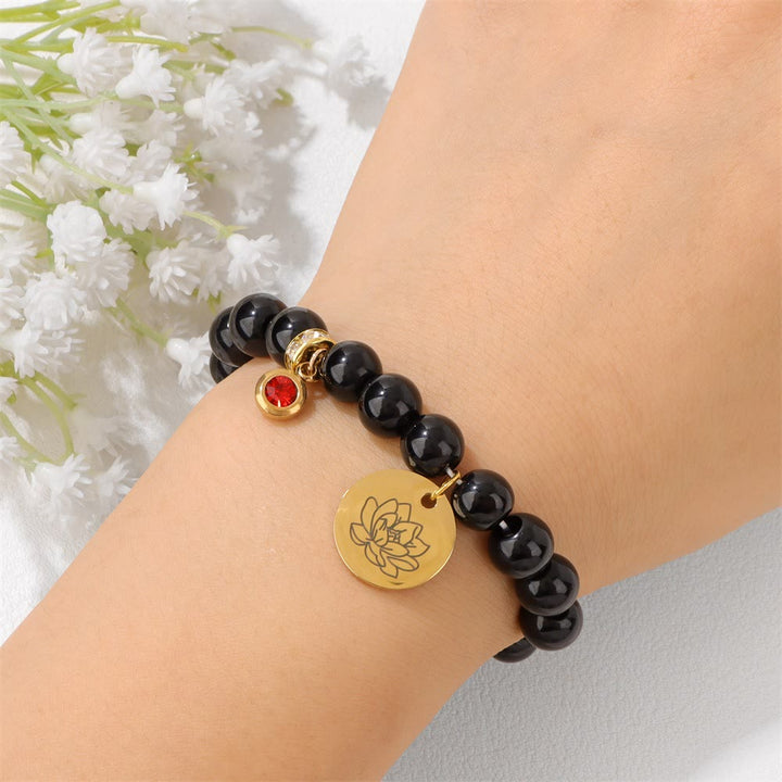 Pulsera de cuentas con dije de flor de nacimiento con piedra natal de 8 mm de Olivenorma
