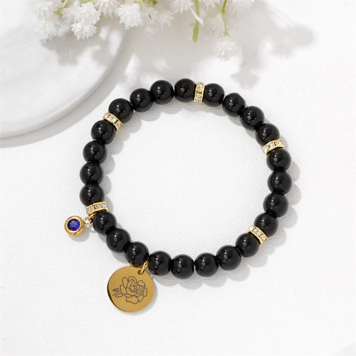 Pulsera de cuentas con dije de flor de nacimiento con piedra natal de 8 mm de Olivenorma