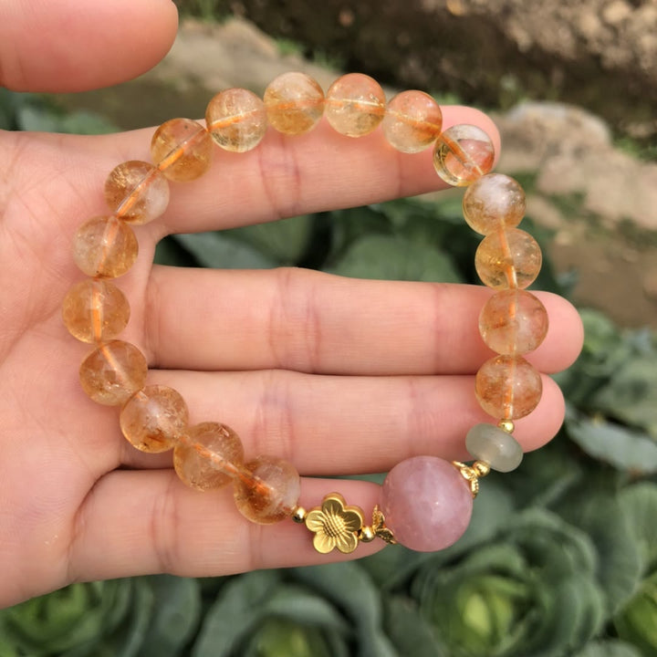 Pulsera de cuentas con dijes de flores de cuarzo rosa citrino natural de Olivenorma