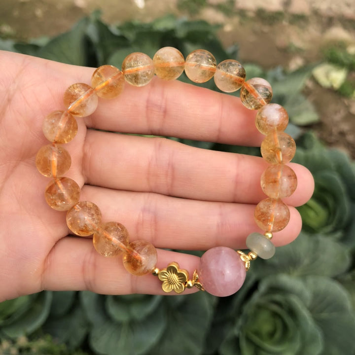 Pulsera de cuentas con dijes de flores de cuarzo rosa citrino natural de Olivenorma