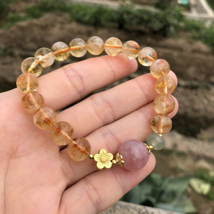 Pulsera de cuentas con dijes de flores de cuarzo rosa citrino natural de Olivenorma