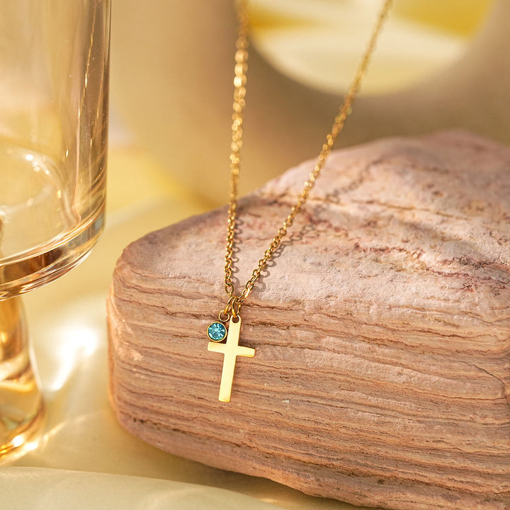 Collar con dije de cruz de aguamarina y símbolo de Hamsa con mal de ojo de Olivenorma