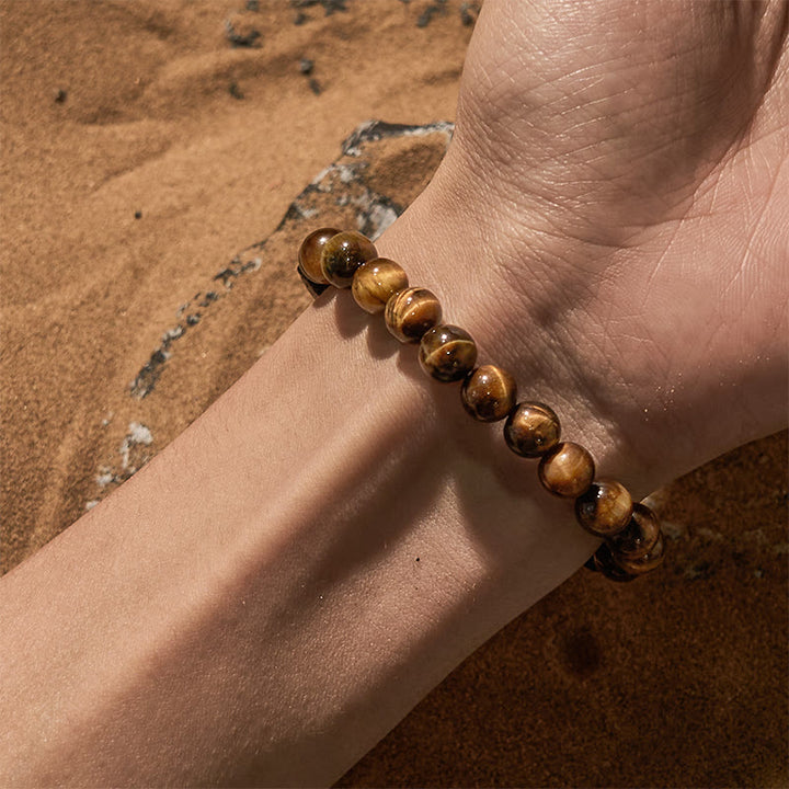 Pulsera de cuentas de ojo de tigre con piedra de lava tallada en cubos de Olivenorma