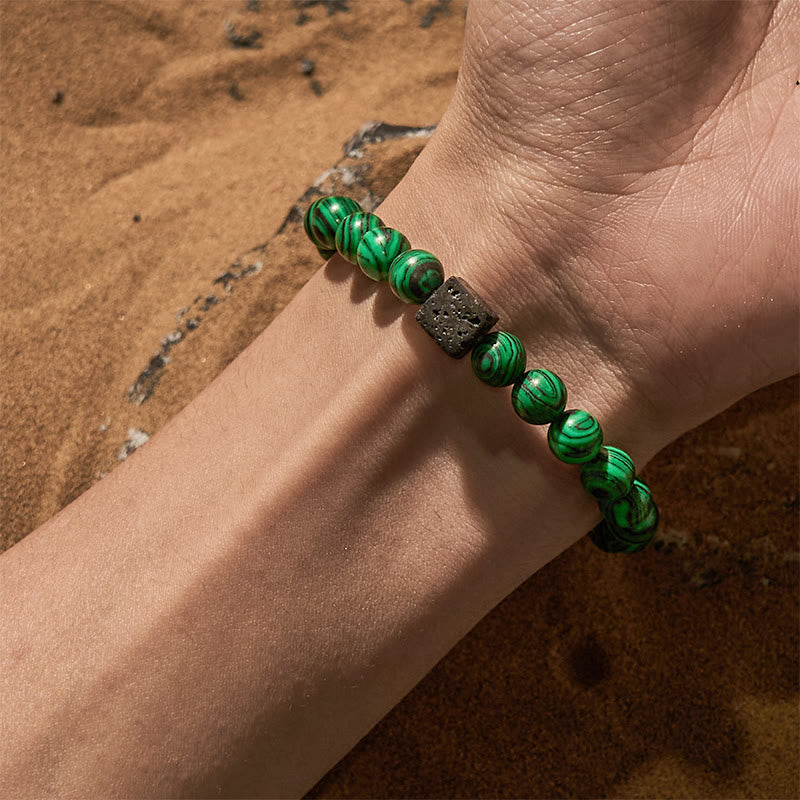 Pulsera de cuentas de malaquita y piedra de lava de Olivenorma
