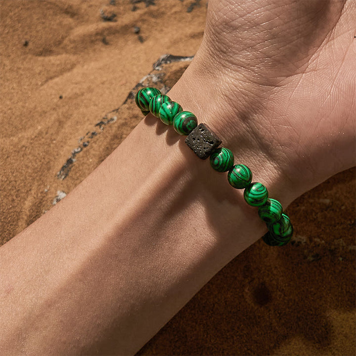 Pulsera de cuentas de malaquita y piedra de lava de Olivenorma