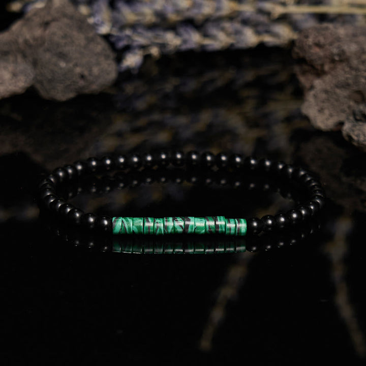 Pulsera de cuentas de malaquita y obsidiana con cuentas rodantes de Olivenorma