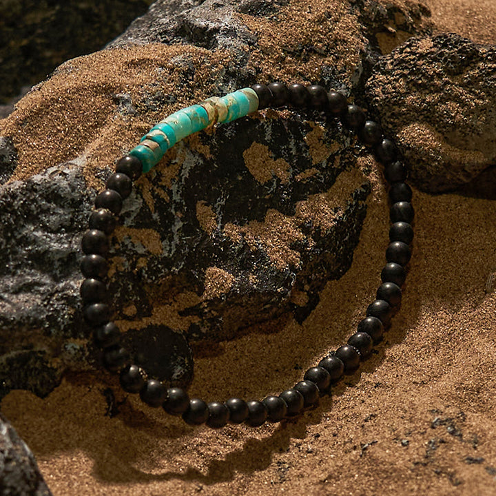 Pulsera de cuentas de piedra del emperador obsidiana con cuentas rodantes de Olivenorma