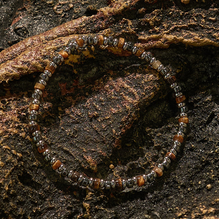 Pulsera de cuentas de hematita y ojo de tigre con cuentas rodantes de Olivenorma