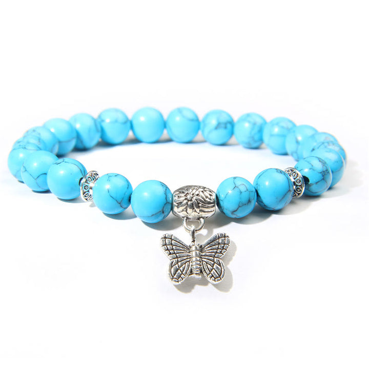 Pulsera con dije de mariposa de turquesa natural de Olivenorma