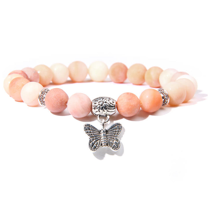 Pulsera con dije de mariposa de turquesa natural de Olivenorma