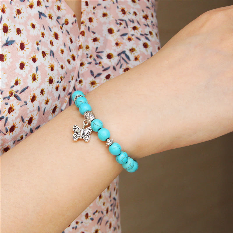 Pulsera con dije de mariposa de turquesa natural de Olivenorma
