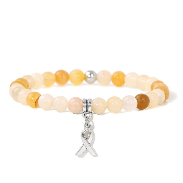 Pulsera de la suerte con cuentas de piedras preciosas naturales y dijes de cinta de Olivenorma