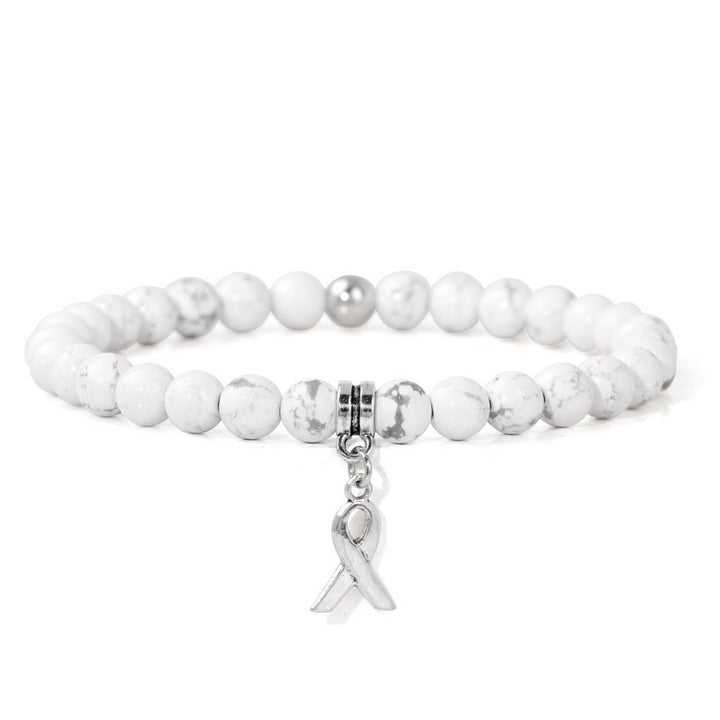 Pulsera de la suerte con cuentas de piedras preciosas naturales y dijes de cinta de Olivenorma