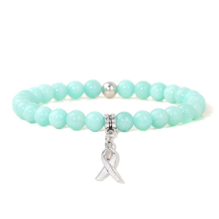 Pulsera de la suerte con cuentas de piedras preciosas naturales y dijes de cinta de Olivenorma