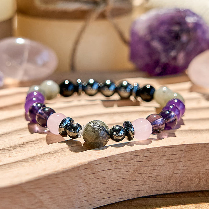 Pulsera de cuentas de hematita, cuarzo rosa, amatista y labradorita de Olivenorma