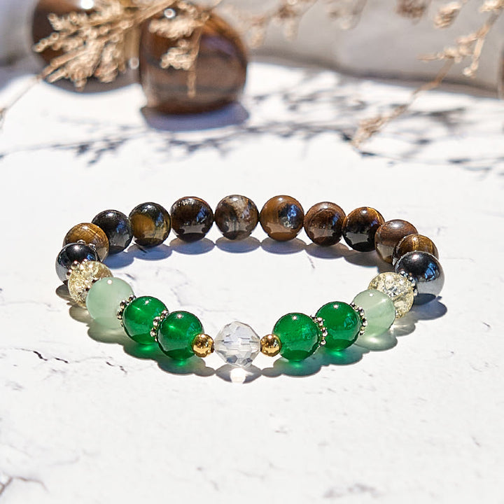 Pulsera de cuentas de peridoto, ojo de tigre y hematita de Olivenorma