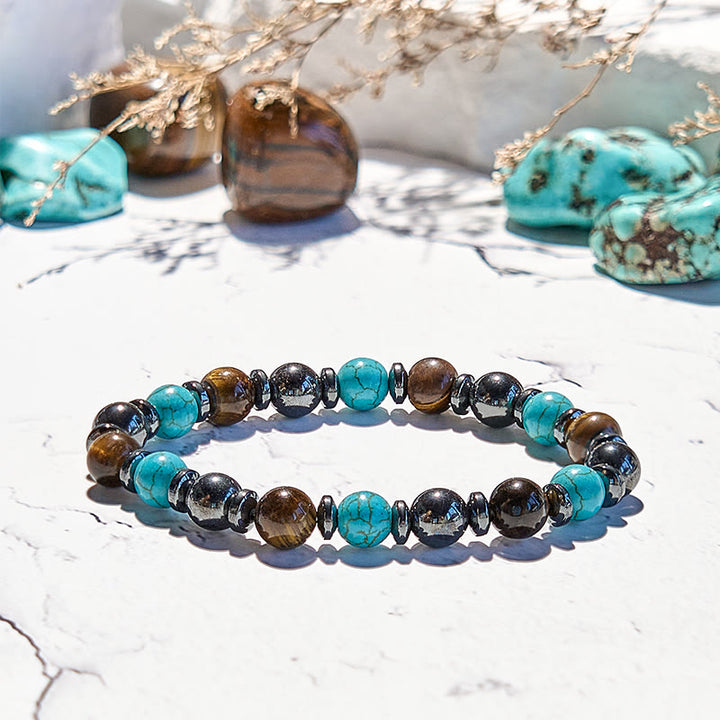 Pulsera de cuentas de turquesa, ojo de tigre y hematita de Olivenorma