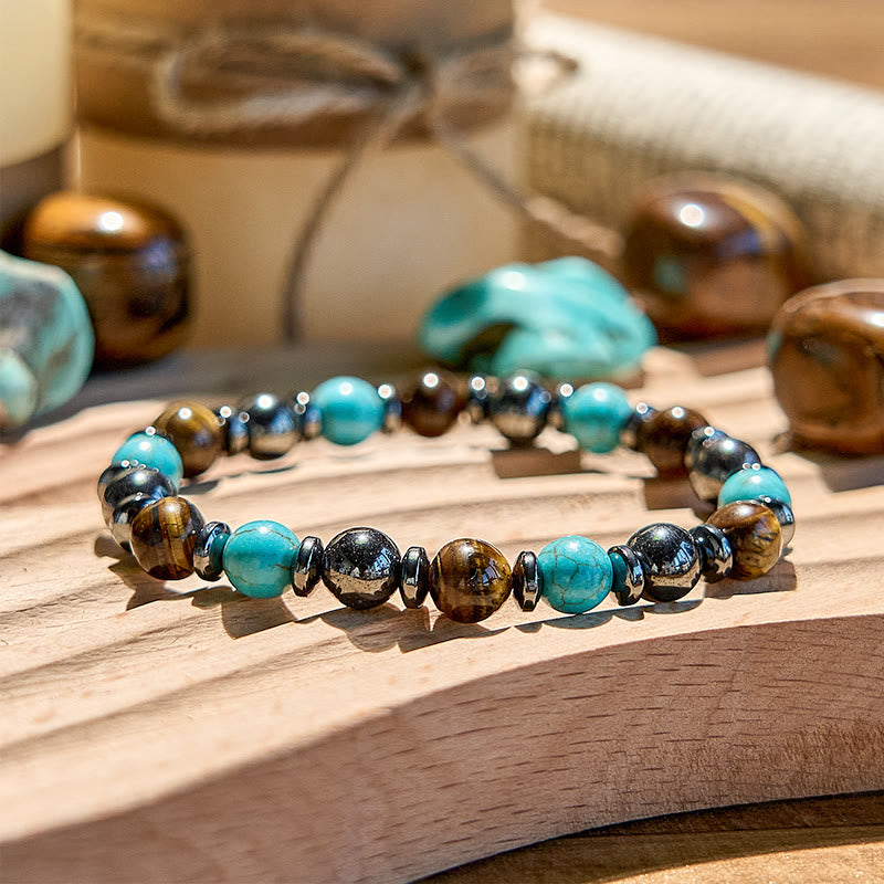 Pulsera de cuentas de turquesa, ojo de tigre y hematita de Olivenorma