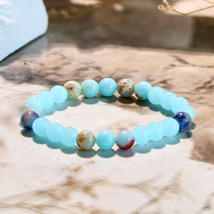 Pulsera de cuentas de aguamarina y agalmatolita natural de Olivenorma