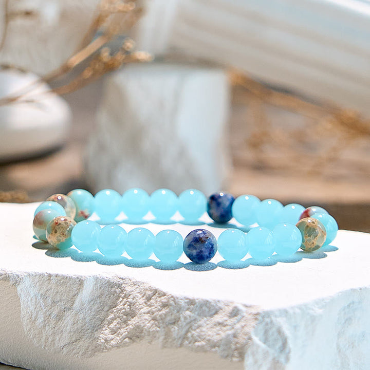 Pulsera de cuentas de aguamarina y agalmatolita natural de Olivenorma
