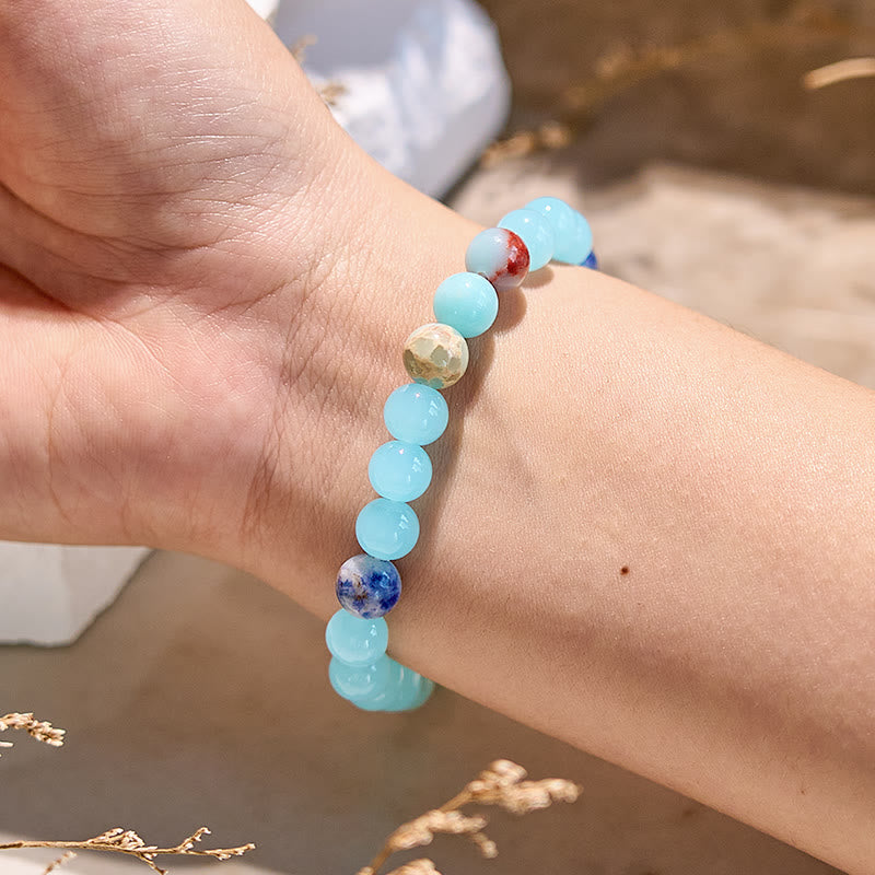Pulsera de cuentas de aguamarina y agalmatolita natural de Olivenorma