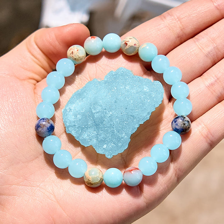 Pulsera de cuentas de aguamarina y agalmatolita natural de Olivenorma