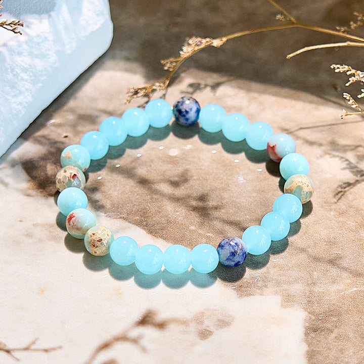 Pulsera de cuentas de aguamarina y agalmatolita natural de Olivenorma
