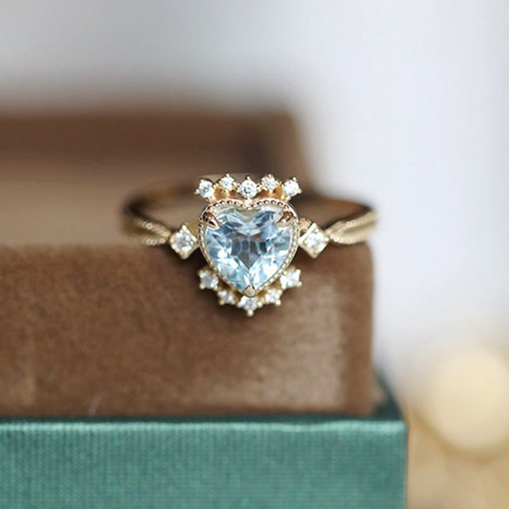 Anillo de topacio azul natural con circonita blanca de Olivenorma