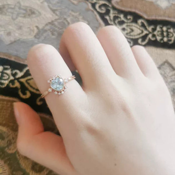 Anillo de topacio azul natural con circonita blanca de Olivenorma