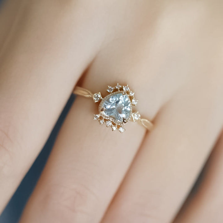 Anillo de topacio azul natural con circonita blanca de Olivenorma