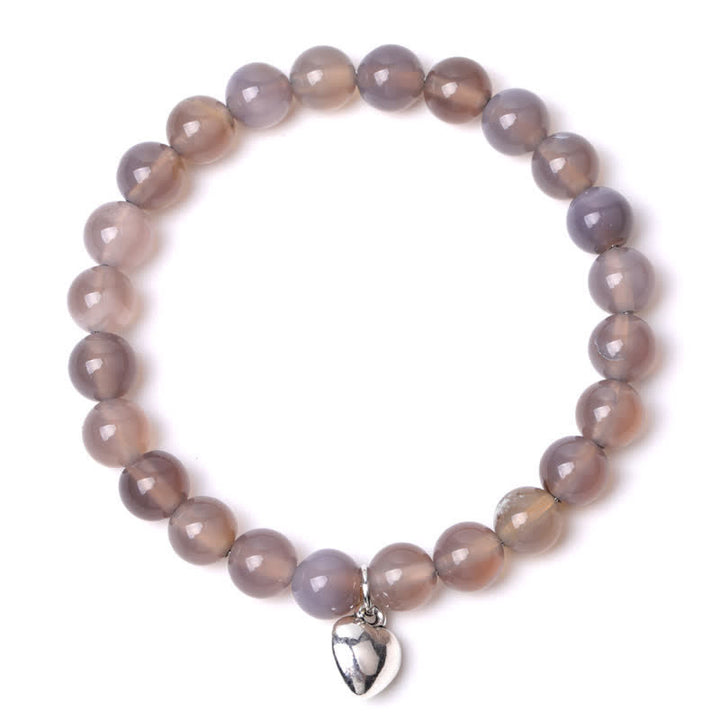 Pulsera de equilibrio curativo de cuarzo con piedra natural en forma de corazón de Olivenorma