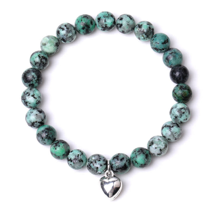 Pulsera de equilibrio curativo de cuarzo con piedra natural en forma de corazón de Olivenorma