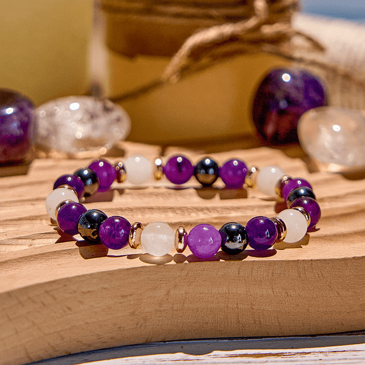 Pulsera de cuentas de hematita, cuarzo rosa y amatista de Olivenorma