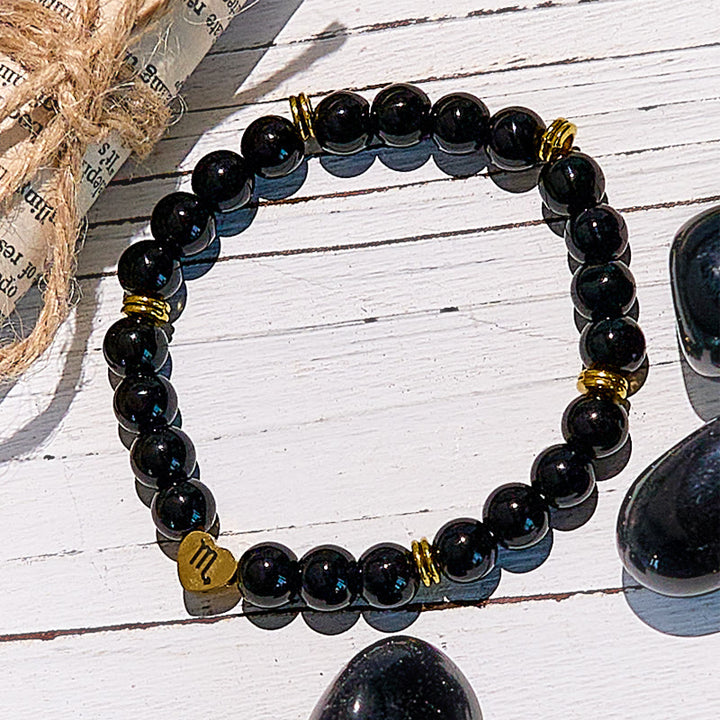 Pulsera de cuentas del zodíaco de obsidiana natural de Olivenorma