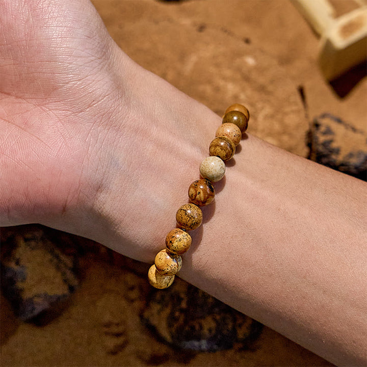 Pulsera de alambre de cobre dorado con cuentas de piedra natural de Olivenorma