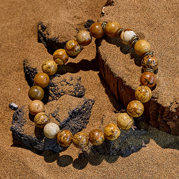 Pulsera de alambre de cobre dorado con cuentas de piedra natural de Olivenorma