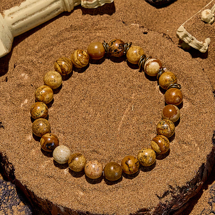Pulsera de alambre de cobre dorado con cuentas de piedra natural de Olivenorma