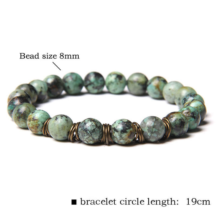 Pulsera de alambre de cobre dorado con cuentas de piedra natural de Olivenorma