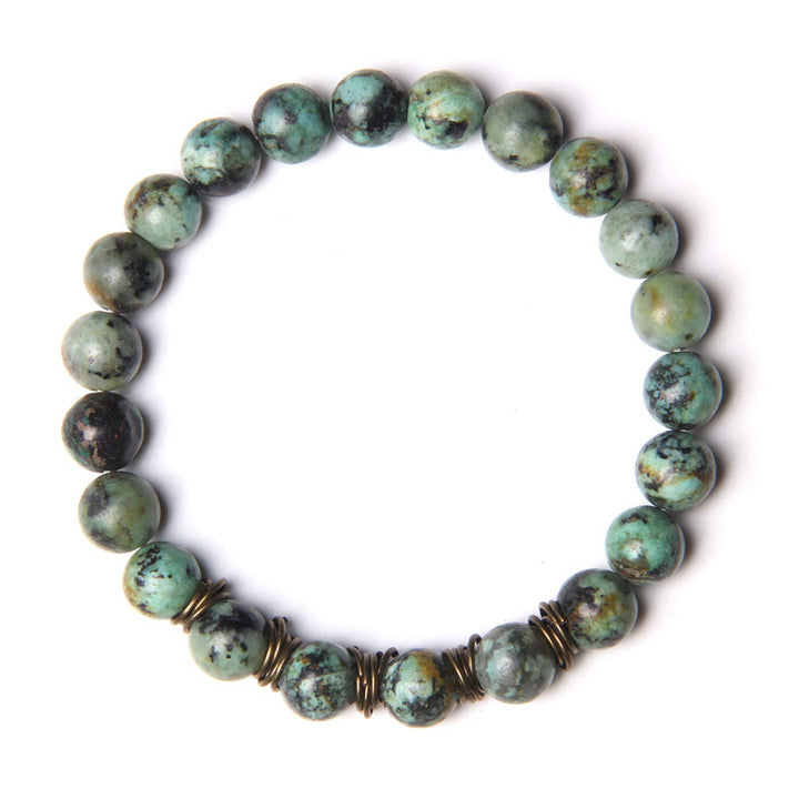 Pulsera de alambre de cobre dorado con cuentas de piedra natural de Olivenorma