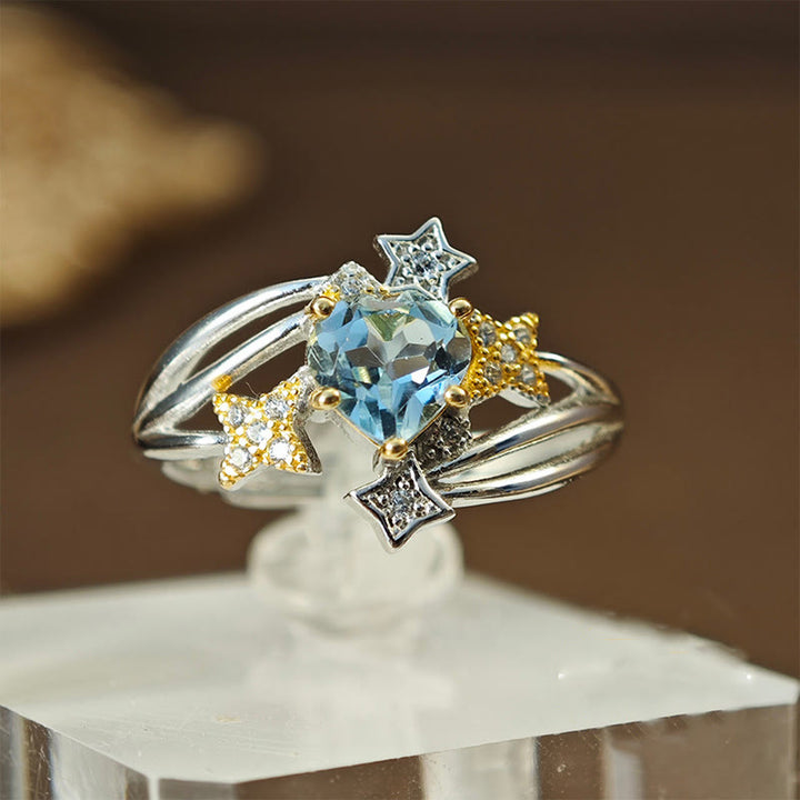 Anillo con estrella y corazón de topacio azul natural de Olivenorma