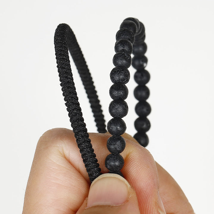Pulsera trenzada con cuentas de piedra de lava natural de Olivenorma
