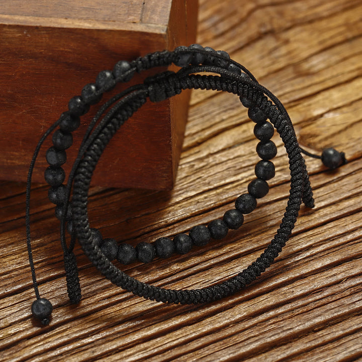 Pulsera trenzada con cuentas de piedra de lava natural de Olivenorma